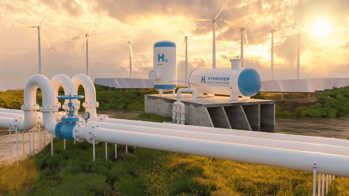 A modern biomethane upgrading facility with stainless steel tanks and pipes under a clear sky.