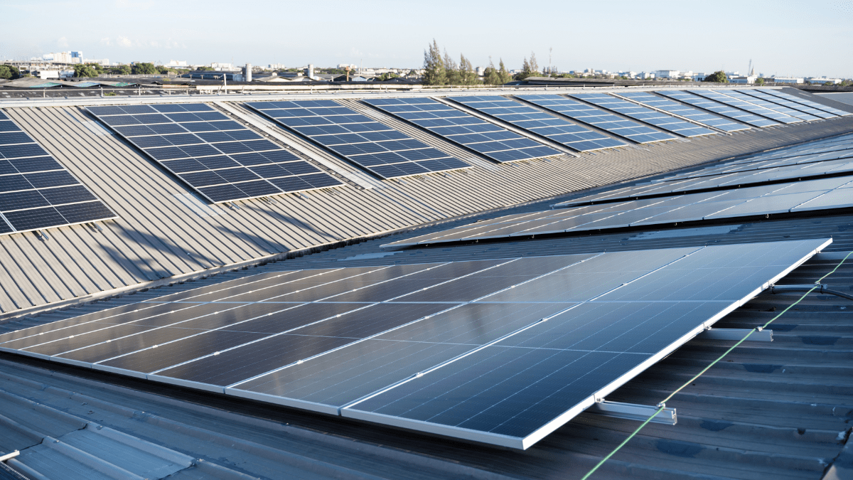 Abstract representation of solar panels on a commercial rooftop building in India