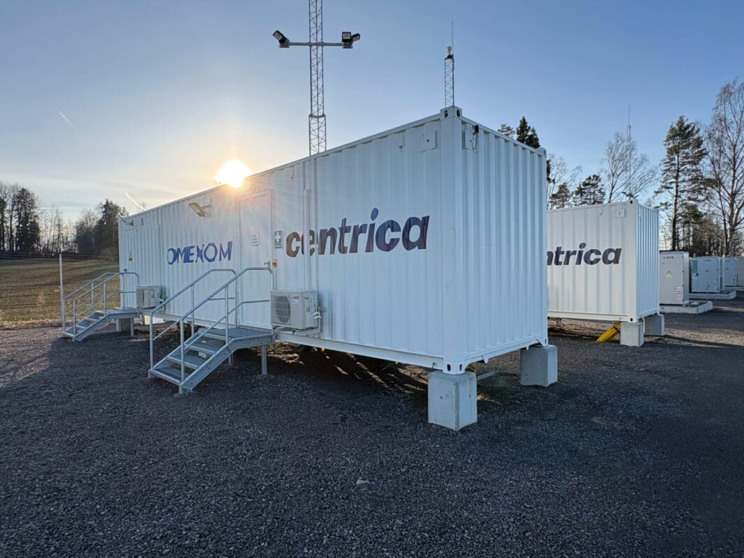 A 40MW battery energy storage system facility under a clear blue Swedish sky.