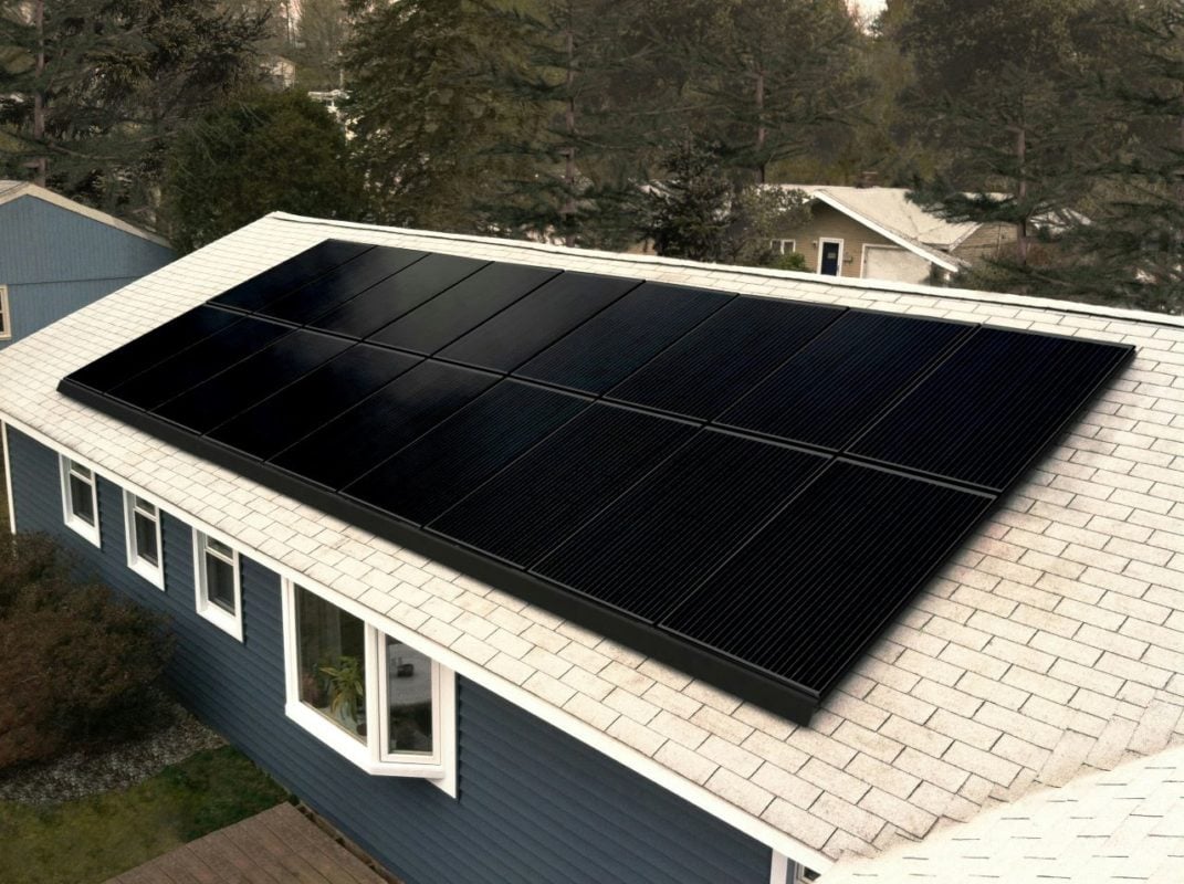 Close up of a residential solar inverter and lithium-ion battery storage unit