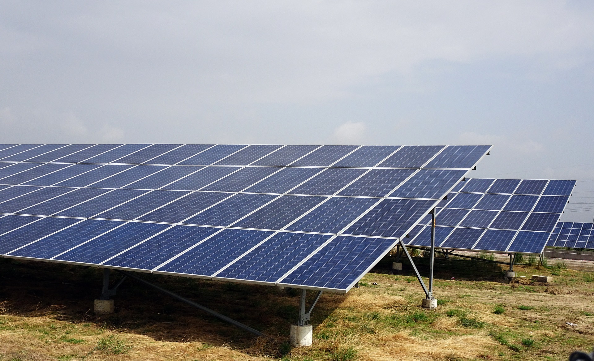 Large scale ground-mounted solar array layout on industrial periphery land