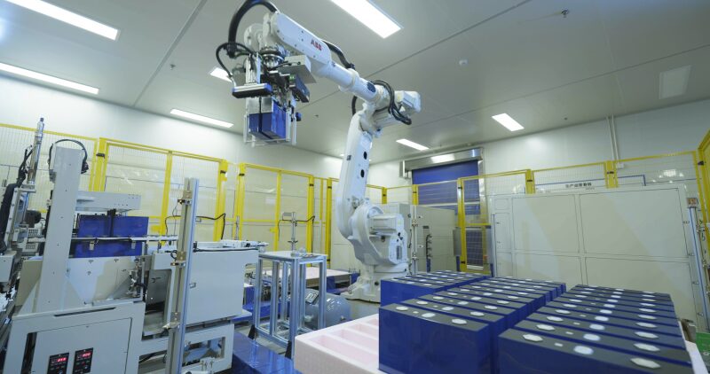 Large-format 587Ah LFP battery cells stacked in a high-capacity industrial BESS rack configuration.
