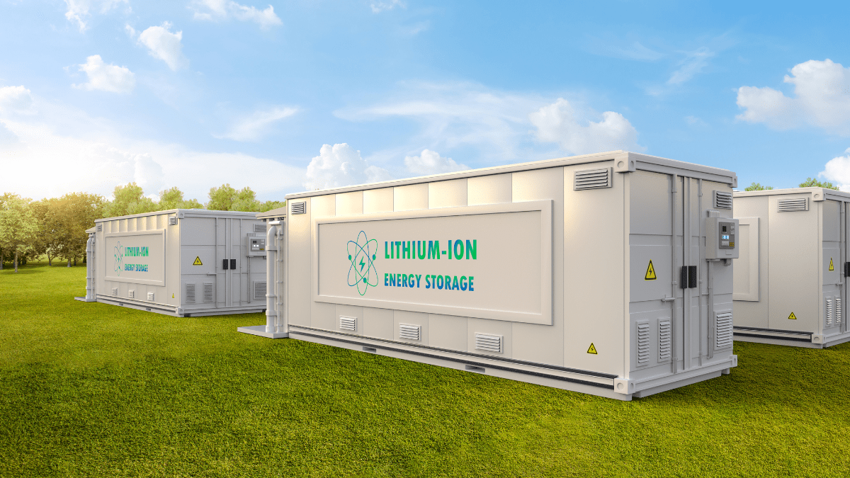 Rows of white battery storage containers at a large-scale utility site in Germany.