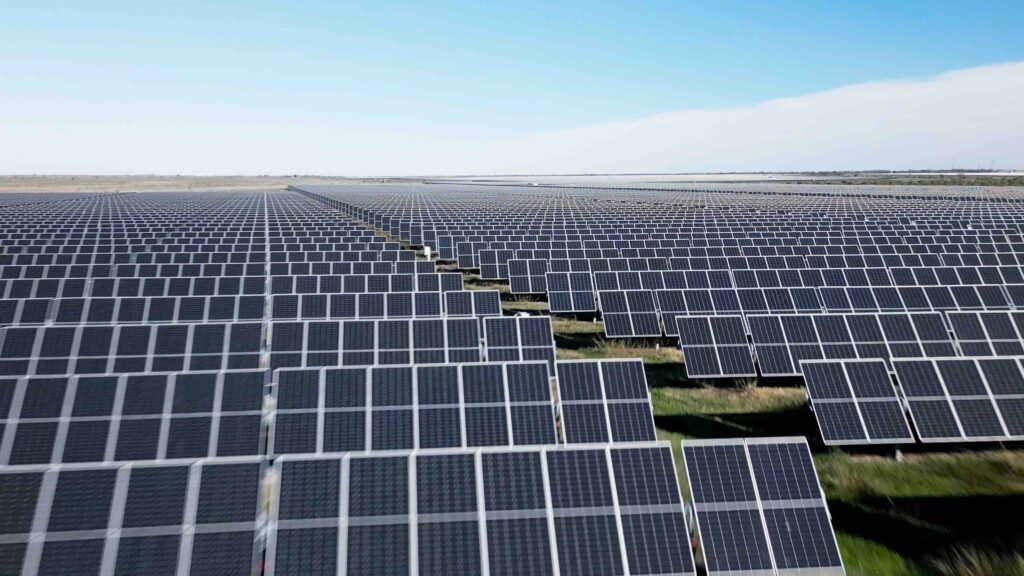 A modern rooftop solar installation in a European city during a bright sunny day