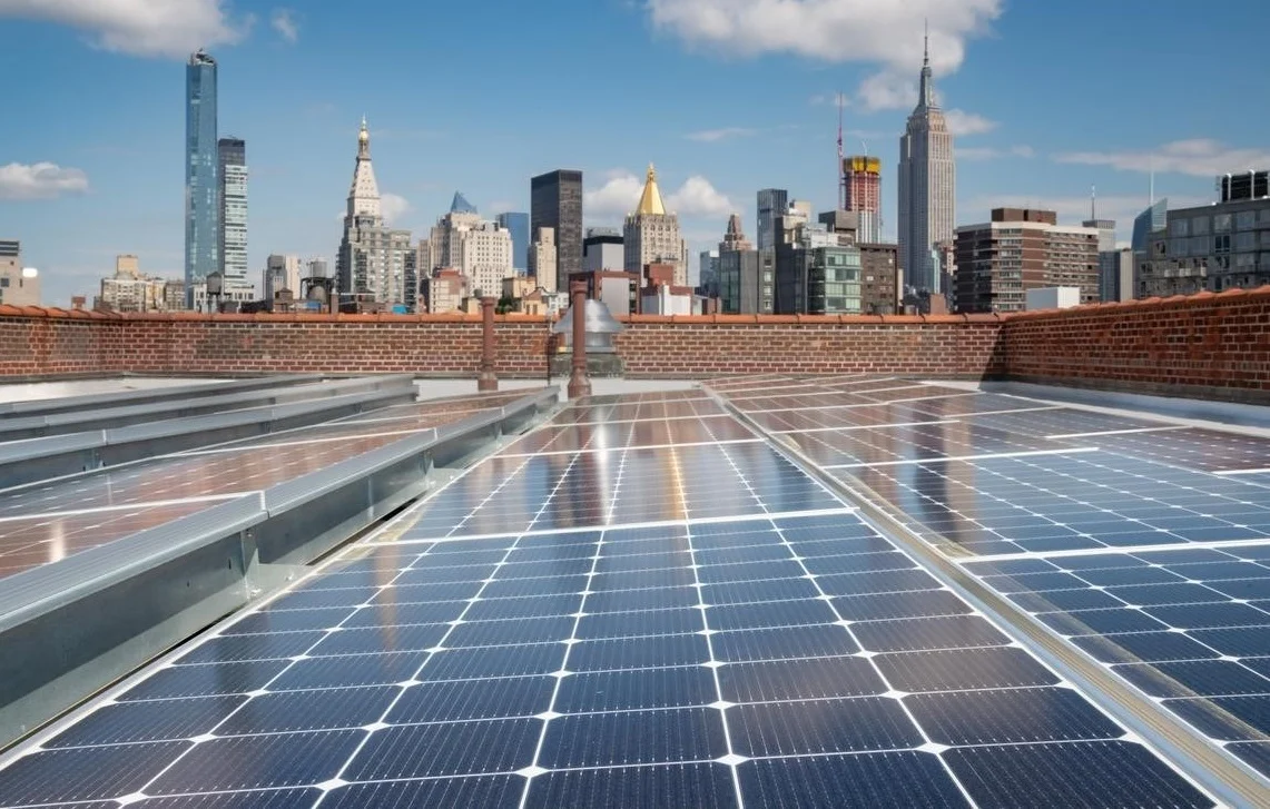 Aerial view of a distributed solar farm integrated into a mixed-use landscape