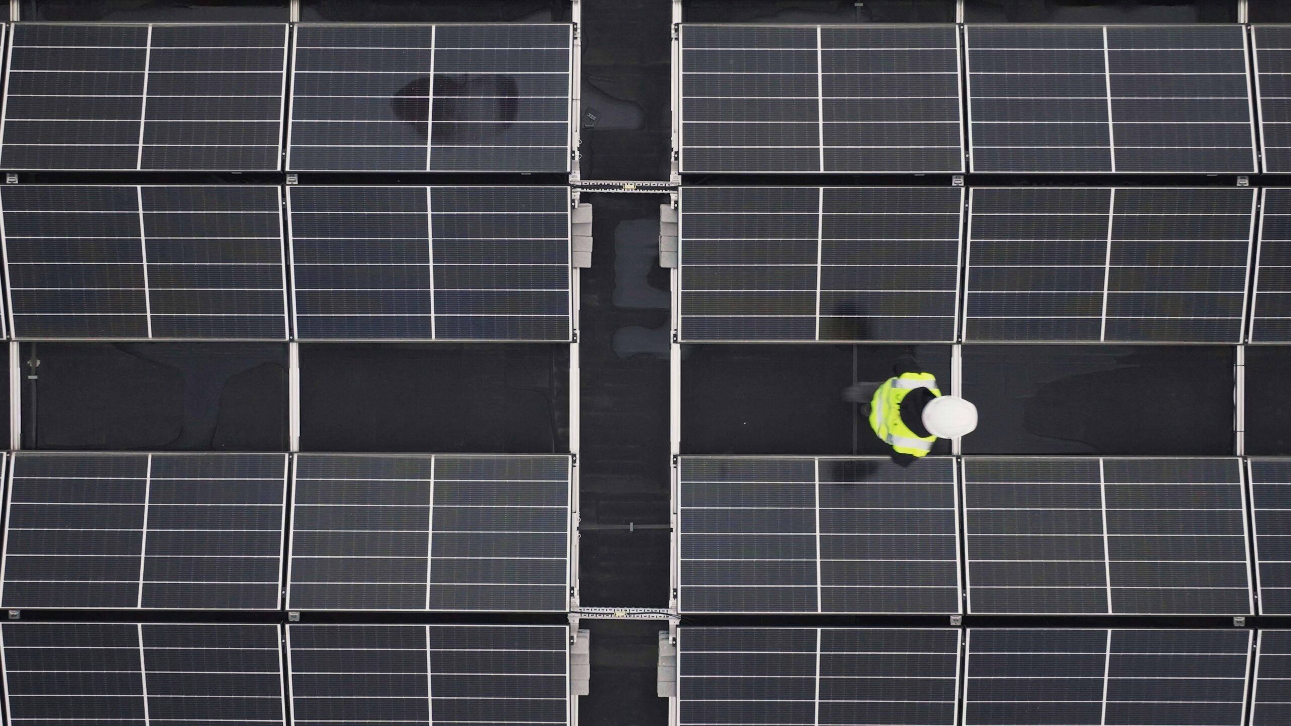 Aerial view of a small Basque village suitable for collective solar self-consumption projects.