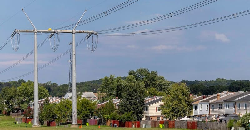 Abstract high-voltage power lines and digital data center cooling fans overlay